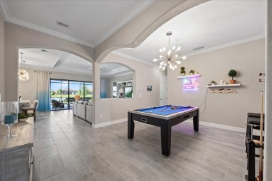 Discover the perfect blend of comfort, elegance, and Florida on Ritz-Carlton Members Golf Club in Florida - for sale on GolfHomes.com, golf home, golf lot