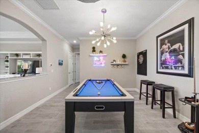 Discover the perfect blend of comfort, elegance, and Florida on Ritz-Carlton Members Golf Club in Florida - for sale on GolfHomes.com, golf home, golf lot