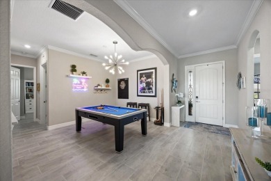 Discover the perfect blend of comfort, elegance, and Florida on Ritz-Carlton Members Golf Club in Florida - for sale on GolfHomes.com, golf home, golf lot