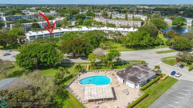 BEST VALUE IN CAMBRIDGE FOR ONE A BEDROOM! IMPACT WINDOWS FRONT on Hillsboro Pines Golf in Florida - for sale on GolfHomes.com, golf home, golf lot