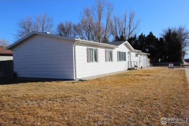 JUST REDUCED!! Come see this gorgeous 3 bedroom 2 bath home in a on Bunker Hill Country Club in Colorado - for sale on GolfHomes.com, golf home, golf lot