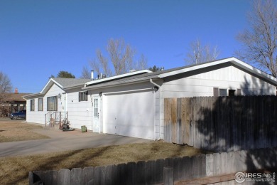 JUST REDUCED!! Come see this gorgeous 3 bedroom 2 bath home in a on Bunker Hill Country Club in Colorado - for sale on GolfHomes.com, golf home, golf lot