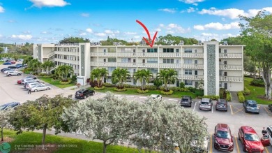 BEST VALUE IN CAMBRIDGE FOR ONE A BEDROOM! IMPACT WINDOWS FRONT on Hillsboro Pines Golf in Florida - for sale on GolfHomes.com, golf home, golf lot