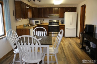 JUST REDUCED!! Come see this gorgeous 3 bedroom 2 bath home in a on Bunker Hill Country Club in Colorado - for sale on GolfHomes.com, golf home, golf lot