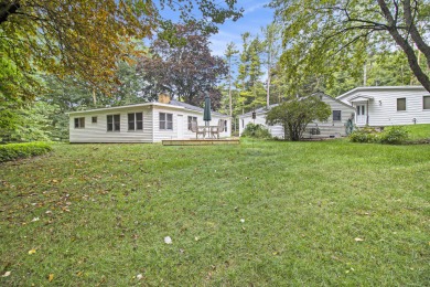 Hamlin Township - This 3-bedroom, 2-bath home sits on 1.5 wooded on Lincoln Hills Golf Club in Michigan - for sale on GolfHomes.com, golf home, golf lot