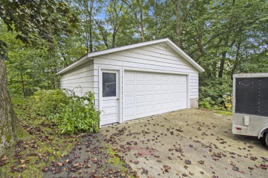 Hamlin Township - This 3-bedroom, 2-bath home sits on 1.5 wooded on Lincoln Hills Golf Club in Michigan - for sale on GolfHomes.com, golf home, golf lot