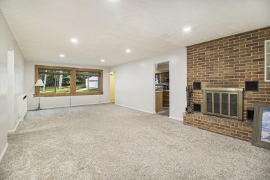 Hamlin Township - This 3-bedroom, 2-bath home sits on 1.5 wooded on Lincoln Hills Golf Club in Michigan - for sale on GolfHomes.com, golf home, golf lot