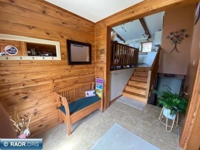 Discover this inviting 3-bedroom, 1.75-bathroom home on Virginia Golf Course in Minnesota - for sale on GolfHomes.com, golf home, golf lot