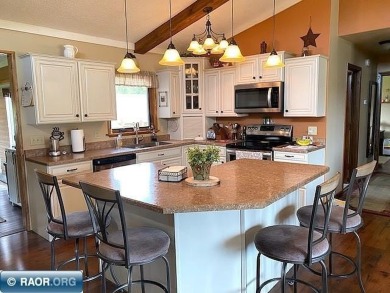 Discover this inviting 3-bedroom, 1.75-bathroom home on Virginia Golf Course in Minnesota - for sale on GolfHomes.com, golf home, golf lot