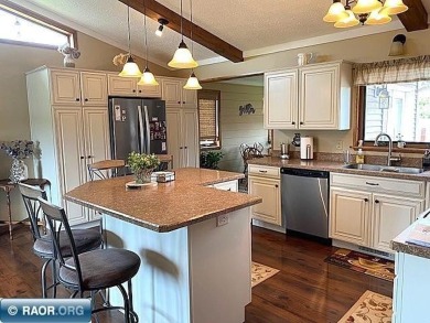 Discover this inviting 3-bedroom, 1.75-bathroom home on Virginia Golf Course in Minnesota - for sale on GolfHomes.com, golf home, golf lot