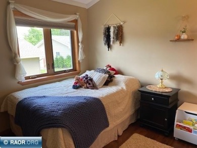 Discover this inviting 3-bedroom, 1.75-bathroom home on Virginia Golf Course in Minnesota - for sale on GolfHomes.com, golf home, golf lot