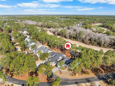 This stunning modern Low Country-style home is perfectly on Members Club At St. James Plantation in North Carolina - for sale on GolfHomes.com, golf home, golf lot