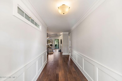 This stunning modern Low Country-style home is perfectly on Members Club At St. James Plantation in North Carolina - for sale on GolfHomes.com, golf home, golf lot