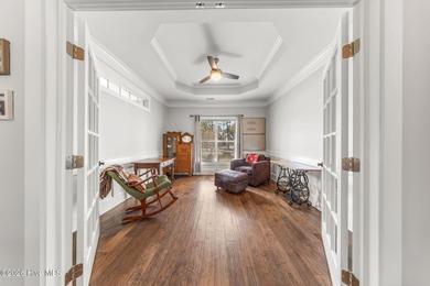 This stunning modern Low Country-style home is perfectly on Members Club At St. James Plantation in North Carolina - for sale on GolfHomes.com, golf home, golf lot