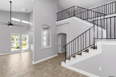 Discover 6210 Royal Palm Ct -- a fully remodeled 5-bedroom on Pelican Point Golf Club in Louisiana - for sale on GolfHomes.com, golf home, golf lot