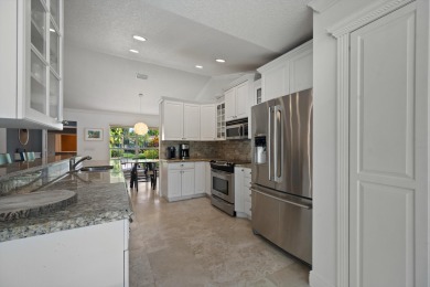 Charming 3-bedroom, 2-bath Las Casita featuring elegant on Palm Beach Polo and Country Club in Florida - for sale on GolfHomes.com, golf home, golf lot