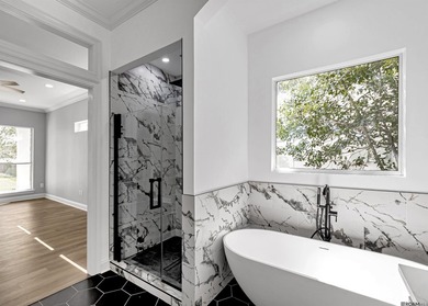 Discover 6210 Royal Palm Ct -- a fully remodeled 5-bedroom on Pelican Point Golf Club in Louisiana - for sale on GolfHomes.com, golf home, golf lot