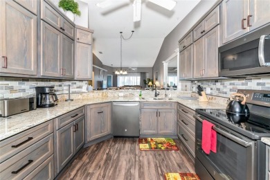 Welcome to your dream home, a beautifully updated, fully on Heritage Oaks Golf and Country Club in Florida - for sale on GolfHomes.com, golf home, golf lot
