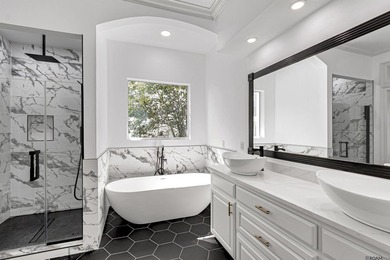 Discover 6210 Royal Palm Ct -- a fully remodeled 5-bedroom on Pelican Point Golf Club in Louisiana - for sale on GolfHomes.com, golf home, golf lot