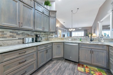 Welcome to your dream home, a beautifully updated, fully on Heritage Oaks Golf and Country Club in Florida - for sale on GolfHomes.com, golf home, golf lot