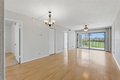 PRICED TO SELL! Whether it's to escape from a cold winter on Isla Del Sol Yacht and Country Club in Florida - for sale on GolfHomes.com, golf home, golf lot