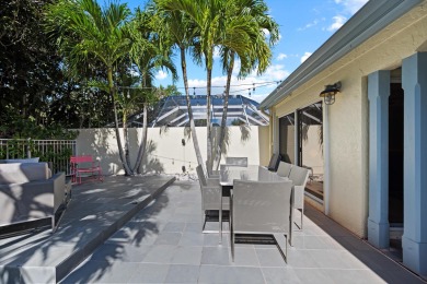 Charming 3-bedroom, 2-bath Las Casita featuring elegant on Palm Beach Polo and Country Club in Florida - for sale on GolfHomes.com, golf home, golf lot