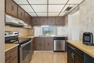 PRICED TO SELL! Whether it's to escape from a cold winter on Isla Del Sol Yacht and Country Club in Florida - for sale on GolfHomes.com, golf home, golf lot