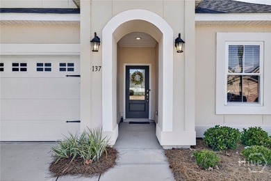A golfer's dream! Light, bright, and truly move-in ready, this on Savannah Quarters Country Club in Georgia - for sale on GolfHomes.com, golf home, golf lot