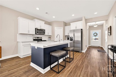 A golfer's dream! Light, bright, and truly move-in ready, this on Savannah Quarters Country Club in Georgia - for sale on GolfHomes.com, golf home, golf lot