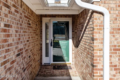 Enjoy easy living in this 2-bedroom, 2-bath patio home located on Cypress Landing Golf Club in North Carolina - for sale on GolfHomes.com, golf home, golf lot