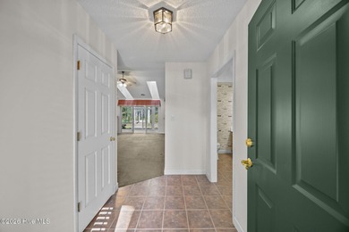 Enjoy easy living in this 2-bedroom, 2-bath patio home located on Cypress Landing Golf Club in North Carolina - for sale on GolfHomes.com, golf home, golf lot