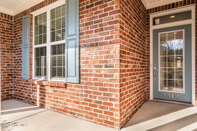 Charming 2-bedroom, 2-bath townhome in the highly desirable on Magnolia Greens Golf Plantation in North Carolina - for sale on GolfHomes.com, golf home, golf lot
