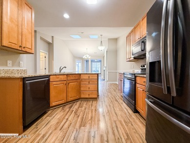 Charming 2-bedroom, 2-bath townhome in the highly desirable on Magnolia Greens Golf Plantation in North Carolina - for sale on GolfHomes.com, golf home, golf lot