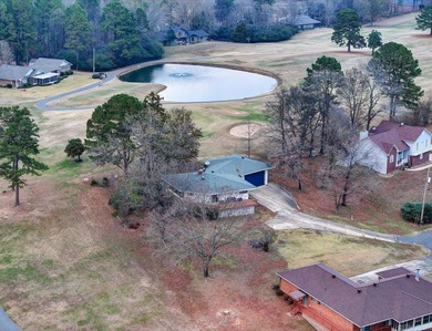 Not the typical 2-bedroom, 2-bath home, This architectural gem on Diamondhead Golf and Country Club in Arkansas - for sale on GolfHomes.com, golf home, golf lot
