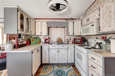 OFFERS WELCOME! This charming two-bedroom, one-bath home is on Island Dunes Country Club in Florida - for sale on GolfHomes.com, golf home, golf lot