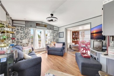 OFFERS WELCOME! This charming two-bedroom, one-bath home is on Island Dunes Country Club in Florida - for sale on GolfHomes.com, golf home, golf lot
