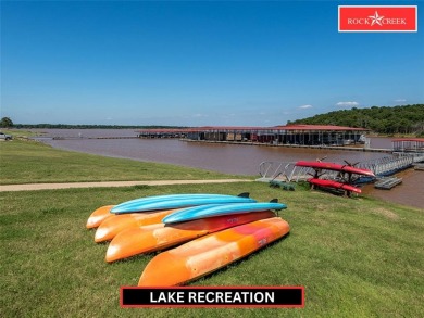 Discover resort-style living at 300 Sycamore Hills Loop in the on Rock Creek Golf Club in Texas - for sale on GolfHomes.com, golf home, golf lot