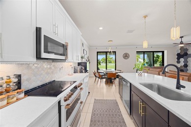 This nearly new home--just about two years old--defines luxury on Woodmont Country Club in Florida - for sale on GolfHomes.com, golf home, golf lot