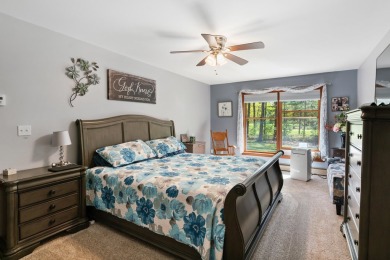 Beautifully crafted 3 bed, 2 full and 2 half bath home in the on Indian River Golf Club in Michigan - for sale on GolfHomes.com, golf home, golf lot