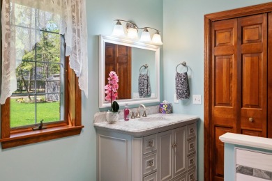 Beautifully crafted 3 bed, 2 full and 2 half bath home in the on Indian River Golf Club in Michigan - for sale on GolfHomes.com, golf home, golf lot