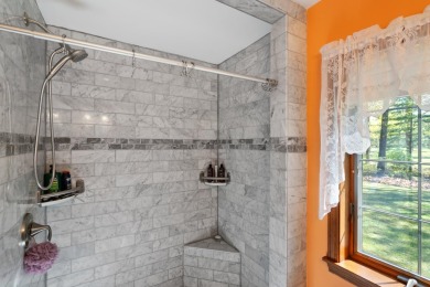 Beautifully crafted 3 bed, 2 full and 2 half bath home in the on Indian River Golf Club in Michigan - for sale on GolfHomes.com, golf home, golf lot