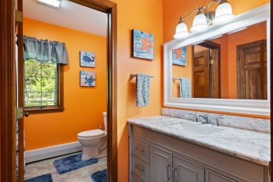 Beautifully crafted 3 bed, 2 full and 2 half bath home in the on Indian River Golf Club in Michigan - for sale on GolfHomes.com, golf home, golf lot