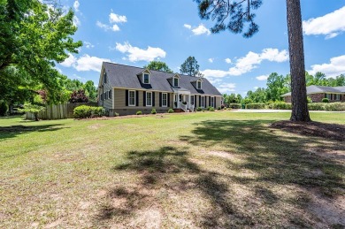 ~ DIVE IN TO THIS TERRELL COUNTY HOME ON 1.11 ACRES + IN-GROUND on Dawson Country Club in Georgia - for sale on GolfHomes.com, golf home, golf lot