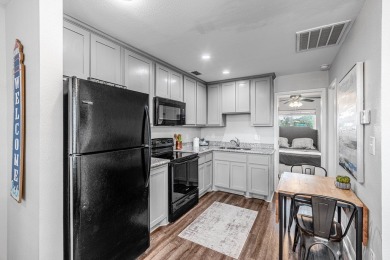 This stunning condo is perfectly situated in a pristine location on Rockport Country Club in Texas - for sale on GolfHomes.com, golf home, golf lot