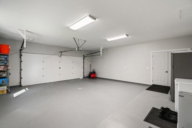 Beautifully crafted 3 bed, 2 full and 2 half bath home in the on Indian River Golf Club in Michigan - for sale on GolfHomes.com, golf home, golf lot