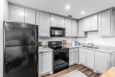 This stunning condo is perfectly situated in a pristine location on Rockport Country Club in Texas - for sale on GolfHomes.com, golf home, golf lot