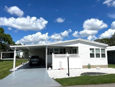 This charming 2-bedroom, 2-bathroom home is move-in ready and on Crystal Lake Club in Florida - for sale on GolfHomes.com, golf home, golf lot