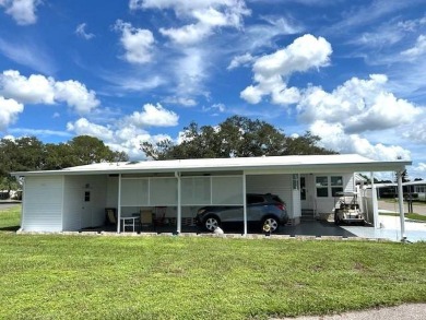 This charming 2-bedroom, 2-bathroom home is move-in ready and on Crystal Lake Club in Florida - for sale on GolfHomes.com, golf home, golf lot