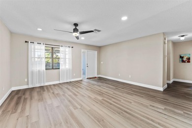 Beautiful completely renovated 3 bedroom, 2 bath 1805 sq ft home on North Lakes Golf Course in Florida - for sale on GolfHomes.com, golf home, golf lot