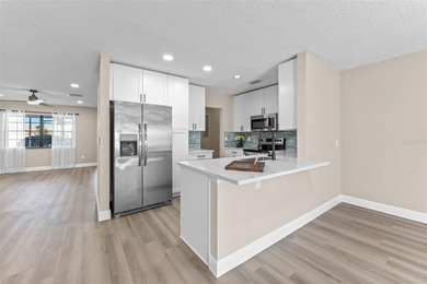 Beautiful completely renovated 3 bedroom, 2 bath 1805 sq ft home on North Lakes Golf Course in Florida - for sale on GolfHomes.com, golf home, golf lot